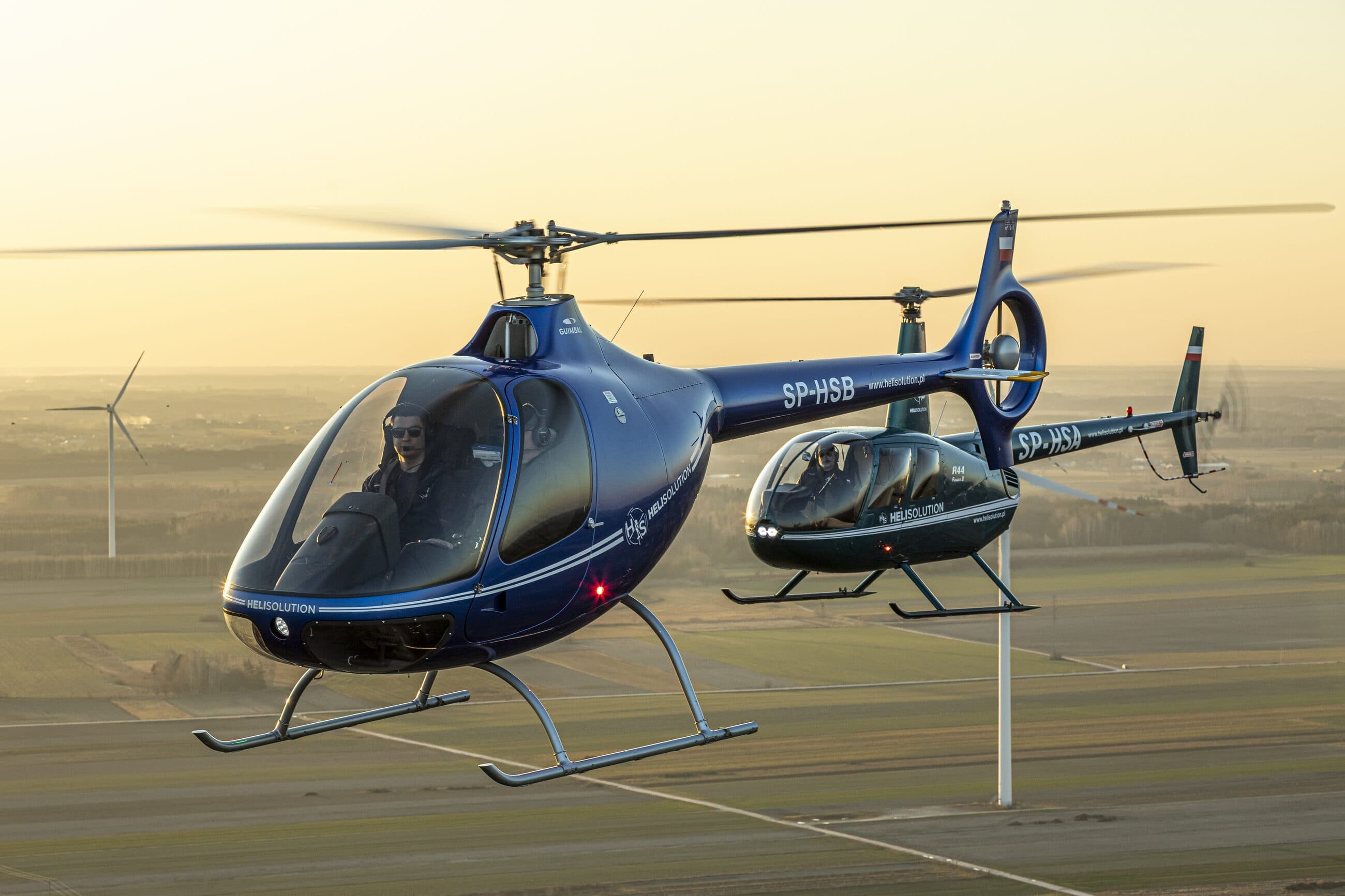 Guimbal Cabri G2 i Robinson R44 Heli Solution w locie formacyjnym